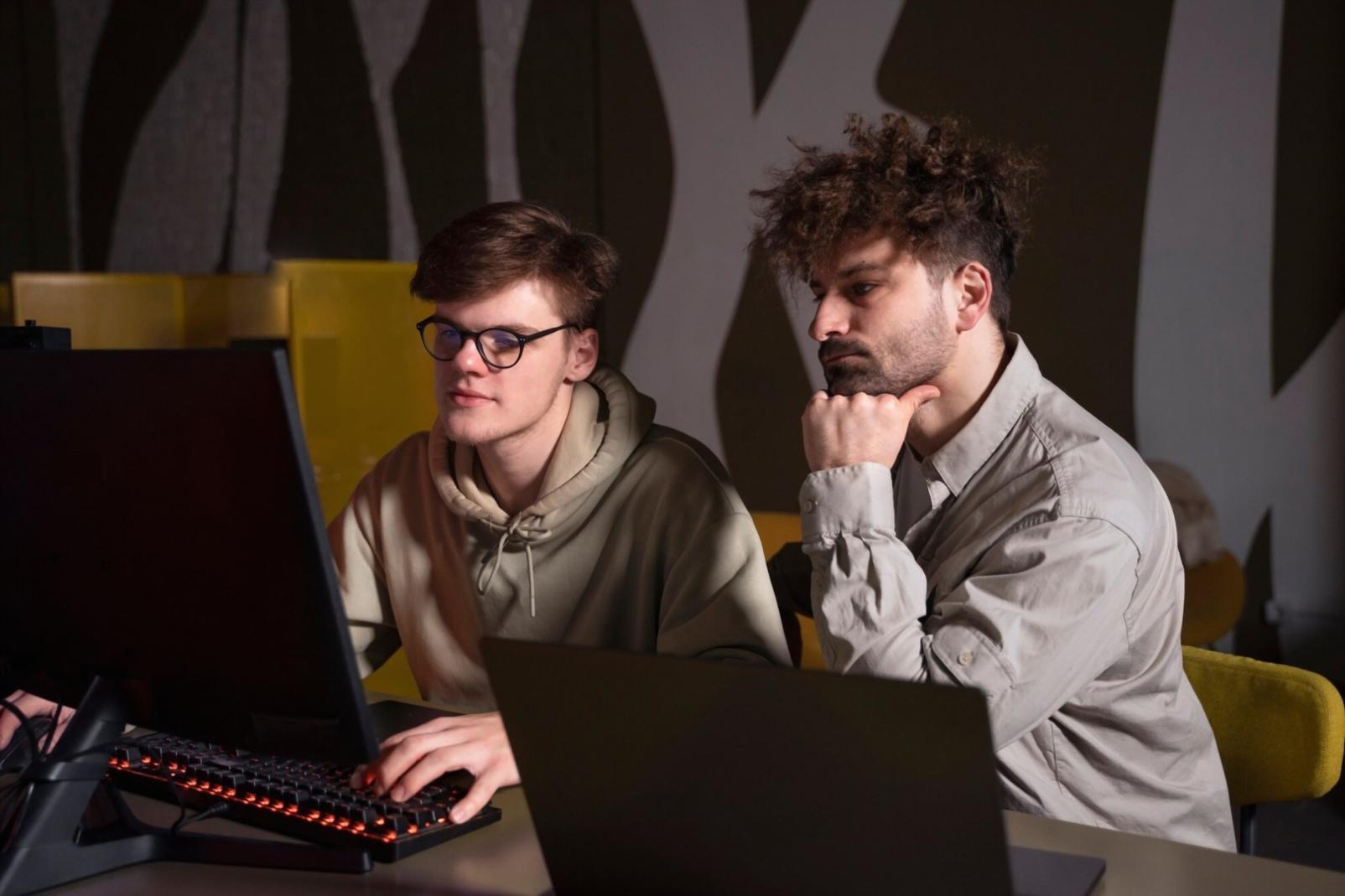 Student working through practical security lab exercise on laptop